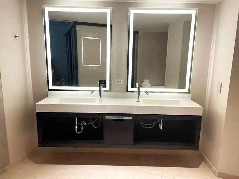 Conrad Hotel, Fabrication and installation of vanities, custom millwork by New Wings in New York
