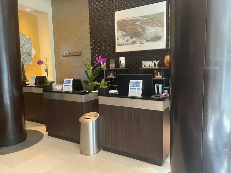 Marriott Hotel, Front desk, custom millwork by New Wings in New York